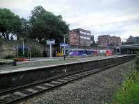 Overview of Wigan Wallgate on 30/06/2016 with the rear of a Southport to Manchester combination at the far platform. <br><br>[David Panton 30/06/2016]