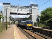 Northern 319376 calls at Wavertree Technology Park with a Warrington Bank Quay to Lime Street service on 13th July 2016. The station opened in 2000 and the booking office on the bridge is at street level, connected on either side by footbridges. <br><br>[Mark Bartlett 13/07/2016]