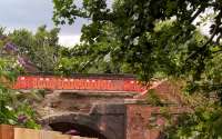 Quite a contrast between the arch over the down lines (left) and that over the up lines (right). The bridge carries Grove Lane over the railway, and provides the only access to the station. The brick wall on the South side collapsed on Monday night, 1st August 2016.<br><br>[Ken Strachan 03/08/2016]
