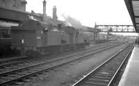 A DMU leaving Doncaster southbound on 29 July 1961 passes J50 0-6-0Ts 68917 and 68928 standing on the centre road. <br><br>[K A Gray 29/07/1961]
