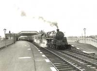 An Ayr - Glasgow train arriving at Troon on 28 March 1955 behind BR Standard class 5 4-6-0 73055.