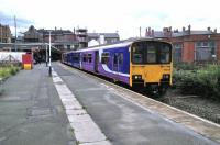 A Southport service calls at Wigan Wallgate on 30 June 2016. A 150 on one end and a Pacer on the other seems to be standard fare on this line.<br><br>[David Panton 30/06/2016]