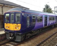 319374 in Northern livery at Huyton on 5 August 2016.<br><br>[Veronica Clibbery 05/08/2016]