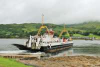 MV <I>Loch Dunvegan</I> pulls away from the slipway at Rhubodach to cross the Kyle of Bute to Colintraive. The vessel was made redundant from its original route by the Skye Bridge. [See image 54270] for an elevated view of the same location. <br><br>[Mark Bartlett 25/07/2016]