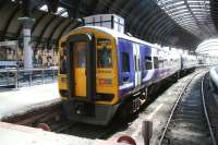 Northern 158906 stands in a sunny bay platform 6 at York on 22 April 2009 awaiting its departure time with an early afternoon service to Blackpool North. <br><br>[John Furnevel 22/04/2009]