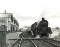 BR Standard tank 80121 prepares to leave Tillynaught Junction in the summer of 1960 with a train for Elgin via the coast.<br><br>[G H Robin collection by courtesy of the Mitchell Library, Glasgow 18/08/1960]