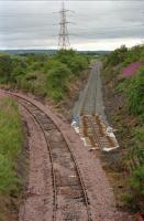 The (then) new sidings for opencast coal being laid in at Stirling Road in 2000. The branch to Costain runs round to the left. Both are now closed.<br><br>[Ewan Crawford //2000]