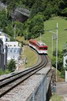 Rigi Bahn cars 22 and 32 leave the lakeside town of Vitznau and immediately begin the steep ascent of the Rigi mountain on 27th June 2016. <br><br>[Mark Bartlett 27/06/2016]