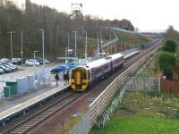 Passengers boarding the 0931 ScotRail service to Edinburgh at Newtongrange on 1 December 2016. I can't help wondering what the sapling survival rate is in the area to the right between the railway fence and the houses of Jenks Loan.<br><br>[John Furnevel 01/12/2016]