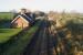 Looking north over the former station at Cumwhinton on 21 January 2017. The rails are rusty at the moment with the closure of the S&C at Eden Brows a short distance to the south.<br><br>[John McIntyre 21/01/2017]