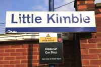 Close-up of Little Kimble station sign with DRA Reminder, August 2016.<br><br>[Ian Dinmore 18/08/2016]