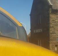 A somewhat unconventional view of St Bees. 37402 seen through the front of a loco-hauled set.<br><br>[John Yellowlees 08/05/2017]
