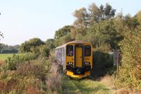 A DMU special approaching Teignbridge Level Crossing on the freight only Heathfield Branch, north west of Newton Abbott, on 2 October 2015. [Ref query 1026]<br><br>[Ian Dinmore 02/10/2015]