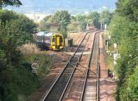 A train off the Bathgate branch about to join the main line at Newbridge Junction on 24 September 2006 with a through service to Newcraighall.<br><br>[John Furnevel 24/09/2006]