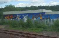 Anti-graffiti artwork at Newbridge Junction.<br>
Other such Network Rail commissioned graffiti deterrent art can be seen at Jordanhill,  Partick, Eglinton Street and Motherwell.<br><br>[John Yellowlees 30/05/2017]