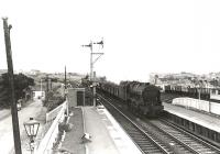 A down coal train about to run through Auchinleck station on 29 July 1961. The locomotive is Royal Scot 46121 <I>Highland Light Infantry, City of Glasgow Regiment</I>.<br><br>[G H Robin collection by courtesy of the Mitchell Library, Glasgow 29/07/1961]