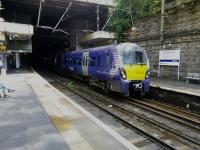 A Helensburgh train pulls into Charing Cross on 5 August. Being substantially underground with trains coming to stop in the gloom at either end, this is a challenging location to photograph!<br><br>[David Panton 05/08/2017]