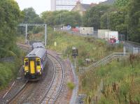 Seen shortly after leaving platform 3 at Anniesland, 156495 forms the 1156 Queen Street via Maryhill service. In the left background strengthening works are in progress on the Strathcona Drive bridge over the main Northbank electric lines.<br><br>[Colin McDonald 20/09/2017]