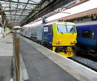 The leaves on the line are safe for the time being as the leafblaster takes<br>
a break at Platform 6 in Perth. Six has no scheduled (or perhaps unscheduled)<br>
passenger use.<br>
<br>
<br><br>[David Panton 04/10/2017]