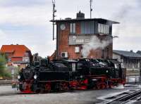 HSB 99 5901 and 99 7232-4 at Wernigerode on 19 September 2017.  Locomotive 99 5901 was built in 1897, as the first locomotive for the Nordhausen-Wernigerode-Eisenbahn and is the oldest narrow-gauge (1000 mm) steam engine still operating in the Harz region.  The Mallet design was particularly suitable for the tight curves (as little as 60 metres radius) on the Harz lines.  Taken out of service in 1989 when the rolling stock was converted to air-braking, it was subsequently fitted with air brakes and re-entered service in 1992, being used for special trains rather than regular services.<br><br>[Norman Glen 19/09/2017]