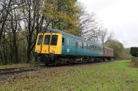 Resident GRC&W <I>Bubble Car</I> 55001 approaches Summerseat, with a CCT van in tow, on a Ramsbottom to Bury service during the ELR Scenic Railcar Gala on 4th November 2017. <br><br>[Mark Bartlett 04/11/2017]