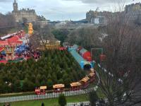 Princes Street Gardens on 23rd December 2017, and a novelty steam train trundling around as part of the Christmas market with Santa Claus driving. To the right is Waverly station.<br>
<br><br>[Alan Cormack 23/12/2017]