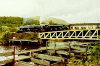 Black 5 Alderman A.E Draper 5305 crossing Banavie swing bridge on its way to Mallaig in August 1987. Thirty years later this loco is still on the main line. <br><br>[Gordon Steel 16/08/1987]