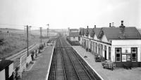 View north of the main line platforms at Tillynaught in 1959. The Banff branch platform is beyond the building to the right.<br><br>[David Murray-Smith 11/09/1959]