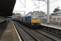 Another Class 68 <I>Cumbrian Coast</I> crew training run from Carlisle arrives in Carnforth on 19th January 2018. 68029 has just two coaches and 68003 <I>Astute</I> in tow and is signalled into the loops for a lunchtime break before the return run. <br><br>[Mark Bartlett 19/01/2018]