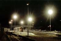 Southbound train in the heavy frost at Muir of Ord.<br><br>[Ewan Crawford //]
