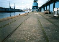 Rails by the Quayside at the King George V Dock.<br><br>[Ewan Crawford //1987]