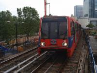 <h4><a href='/locations/W/Westferry'>Westferry</a></h4><p><small><a href='/companies/D/Docklands_Light_Railway'>Docklands Light Railway</a></small></p><p>DLR unit 10 from Beckton to Tower Gateway approaching Westferry station, on 7th June 2008. The train is now on the original London & Blackwall Railway viaduct of 1840 that originally closed to passengers in 1926 and to freight in 1962.  It was revived for the first sections of the Docklands Light Railway in 1987 and is now a Grade 1 Listed Structure by English Heritage.   2/46</p><p>07/06/2008<br><small><a href='/contributors/David_Bosher'>David Bosher</a></small></p>