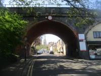 <h4><a href='/locations/M/Muswell_Hill'>Muswell Hill</a></h4><p><small><a href='/companies/M/Muswell_Hill_Railway'>Muswell Hill Railway</a></small></p><p>View west through the main arch of the former Muswell Hill viaduct on the Finsbury Park to Alexandra Palace line, with St. Michaels Church on top of the hill, framed by the arch, on the afternoon of 19th April 2021. This line opened in 1873 as a branch of the GNR's Northern Heights lines and but for WWII would now be part of the London Underground Northern Line but it closed in 1954 and is now part of the Parkland Walk footpath.    37/46</p><p>19/04/2021<br><small><a href='/contributors/David_Bosher'>David Bosher</a></small></p>