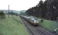 Brush Type 4 D1841 approaches Abington station with train from Manchester in the summer of 1965.<br><br>[John Robin 10/07/1965]
