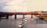 Westbound train crosses Leven Viaduct. Right hand side of photograph spoiled by double exposure ... very cheap camera.<br><br>[Ewan Crawford //1987]