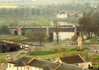 Southbound train crossing the viaduct north of Stirling.<br><br>[Ewan Crawford //1988]