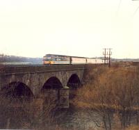 Diverted eastbound 477 crossing the Clydebridge Viaduct.<br><br>[Ewan Crawford //1988]