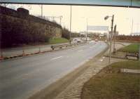 Looking east at what was once part of the railway serving the Queens Dock. The line connected to the mainline at Stobcross. To the left is the open former Stobcross Railway. The dock lines are now the Clydeside Expressway. [See image 49784]<br><br>[Ewan Crawford //1988]