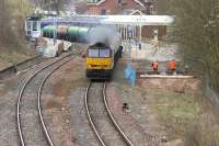 The driver of a northbound oil train applies the boot after passing through Dumfries station in April 2006.<br><br>[John Furnevel 17/04/2006]