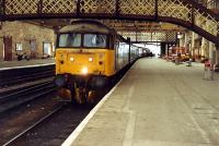 Inverness bound train in Perth station. This was one of the platforms created in the huge rebuild of Perth General.<br><br>[Ewan Crawford //1988]