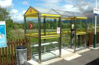 The new HITRANS shelter at Banavie station. New shelters such as these are being installed all over Scotland - the first investment in shelters for some time.<br><br>[Ewan Crawford 28/05/2006]
