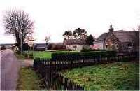 Looking south at the former Aultmore station viewed from the roadside.<br><br>[Ewan Crawford //]