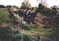 View from the embankment of the Lanarkshire and Dumbartonshire Railway looking east over the now lifted tracks of the Mountblow Oil Terminal, Old Kilpatrck.<br><br>[Ewan Crawford //]