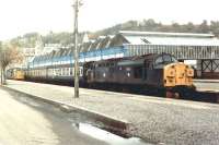 Scene at Oban in October 1984, with 37027 <I>Loch Eil</I> about to depart with a train for Glasgow Queen Street.<br><br>[John Furnevel 10/10/1984]