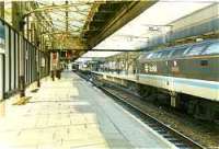 Class 47 on northbound train with Class 47 in distance with train from Inverness at Aberdeen station. View looks north.<br><br>[Ewan Crawford //]