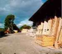 Burnbrae goods shed, now in use by a timber company, on the former Burnbrae Dyeworks branch.<br><br>[Ewan Crawford //]