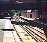 Looking south at Dalmarnock (Low Level) with distant class 303 approaching.<br><br>[Ewan Crawford //]