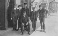 Staff on Ardler platform (looking east) in 1920. Ardler station was closed to passengers in June 1956.<br><br>[David Gellatly Collection 04/09/1920]