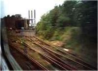 Sidings at Upper Greenock, view looking north, viewed from passing class 303.<br><br>[Ewan Crawford //]