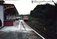 Looking north east at Inverkip station, class 303 entering from Greenock end.<br><br>[Ewan Crawford //]